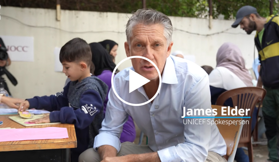 A man on a video speaking to camera
