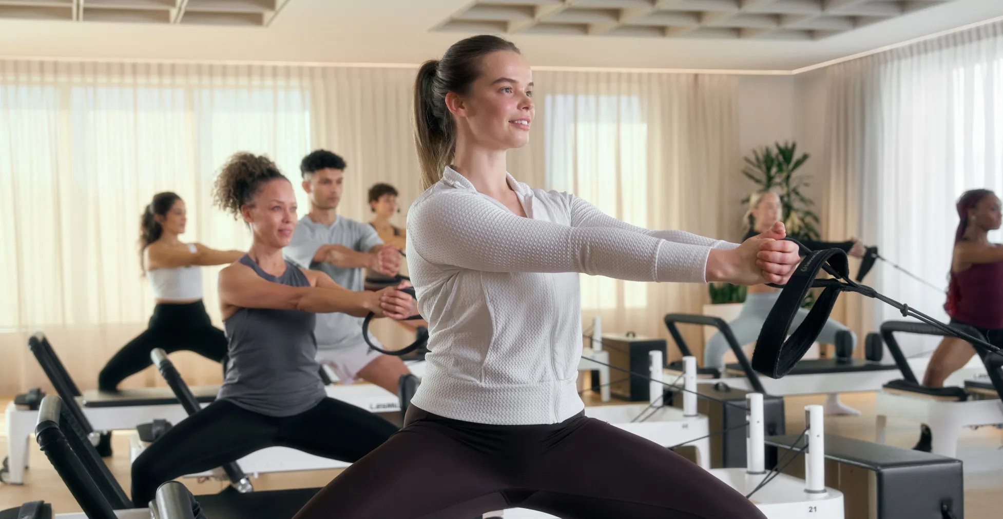 Summer Bradley at the front of Reformer class