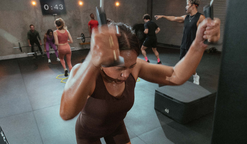 A woman using the Ski Erg in a circuit workout