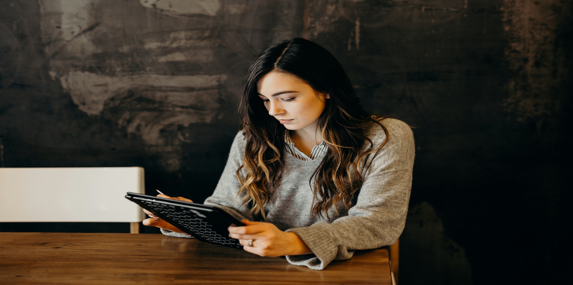 Illustration of an Australian small business owner reviewing leave without pay policies with an employee in a modern office setting.