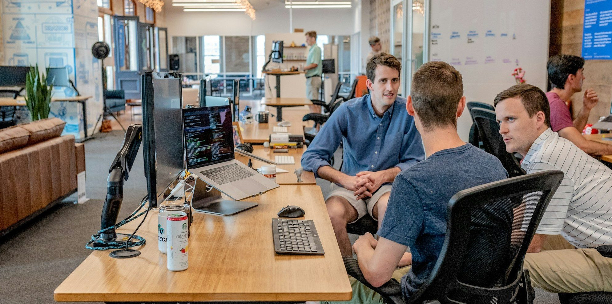 A small business owner reviewing a privacy policy beside a timeline of Privacy Act reform dates from 2024 through December 2026.