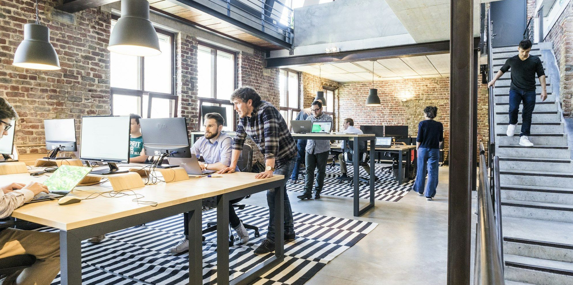 A taxable payments annual report form listing contractor ABNs and payment totals, with a 28 August deadline circled on a calendar.