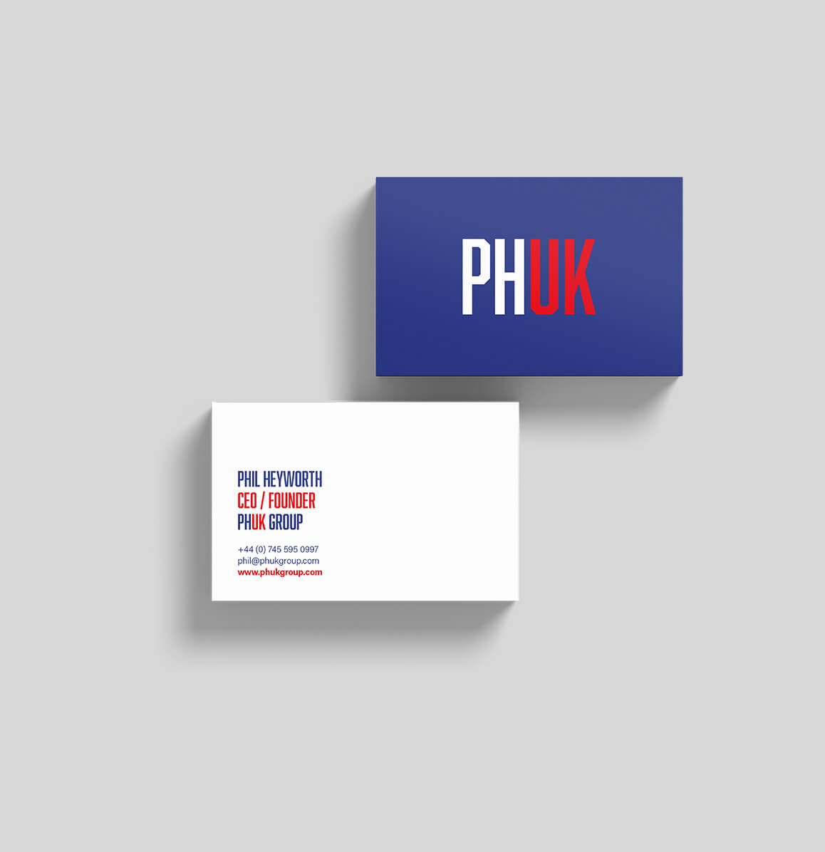PHUK Group business card designed by Sprouto, featuring bold typography and modern branding elements on a sleek, professional layout. 