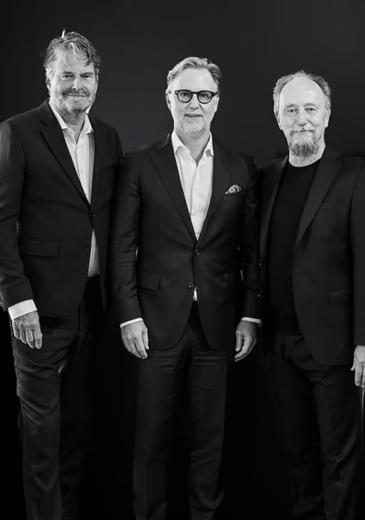 Three lawyers standing in the office