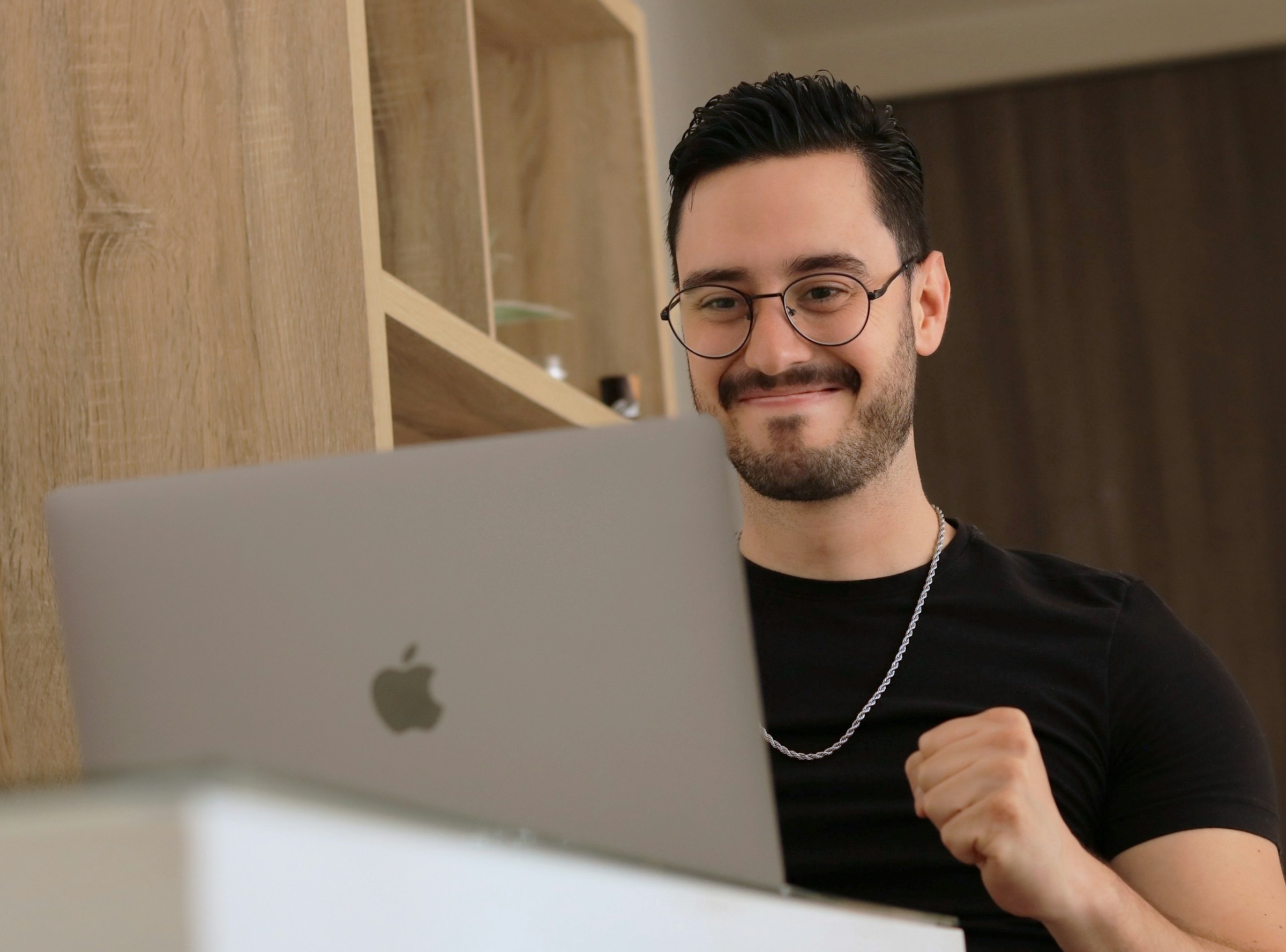 man looking happy - A Level Grading System