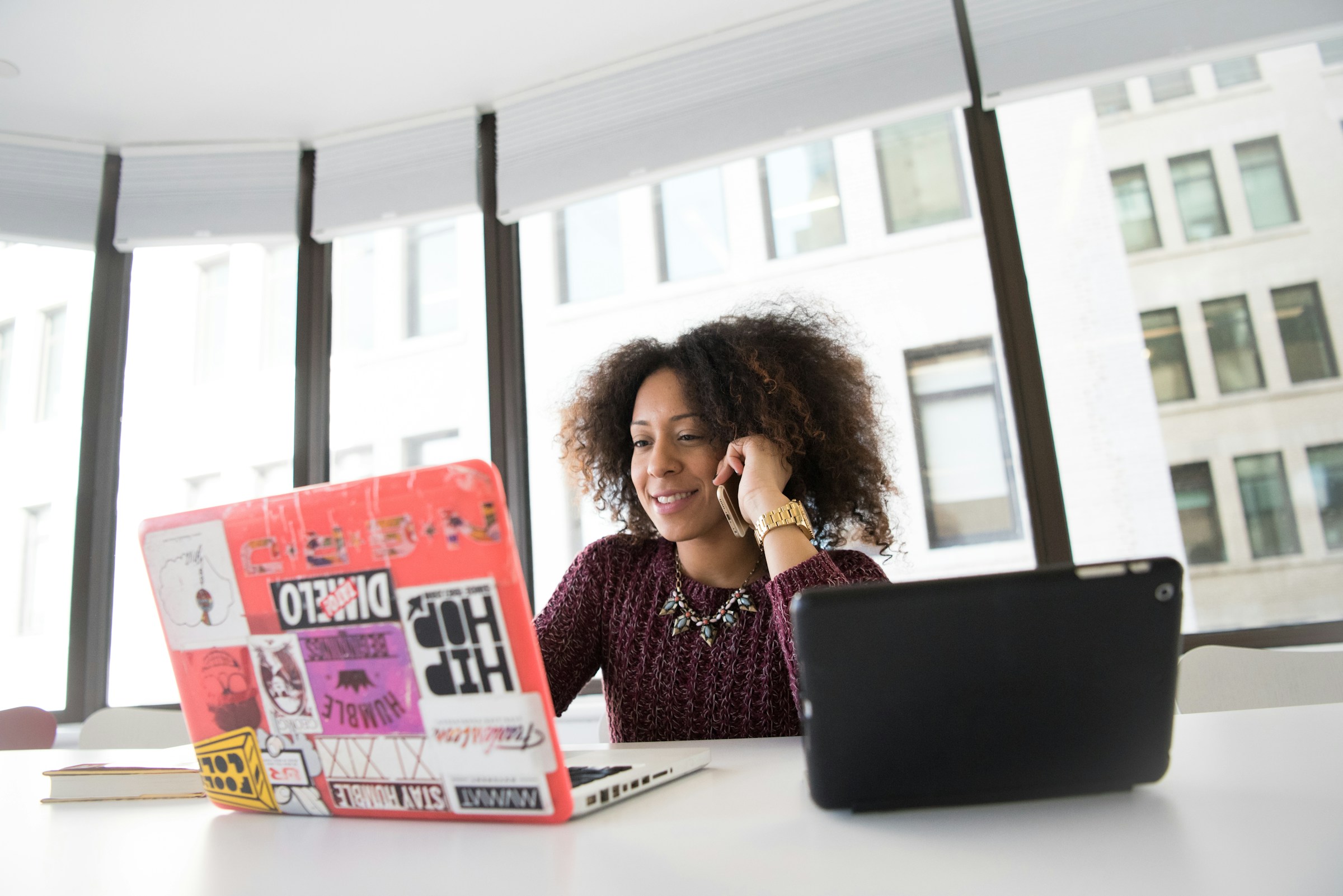 woman on a laptop - A Level Grading System