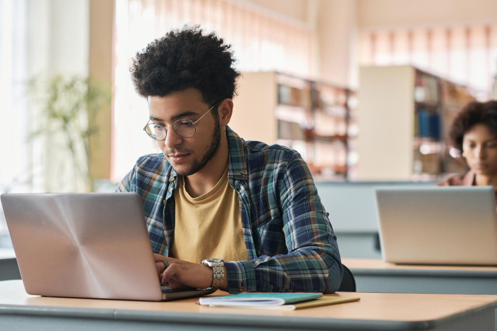 student studying on a laptop - Benefits of AI for Students