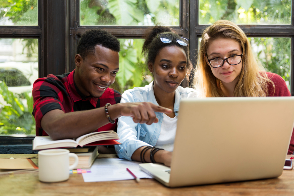 students sitting together - Benefits of AI for Students