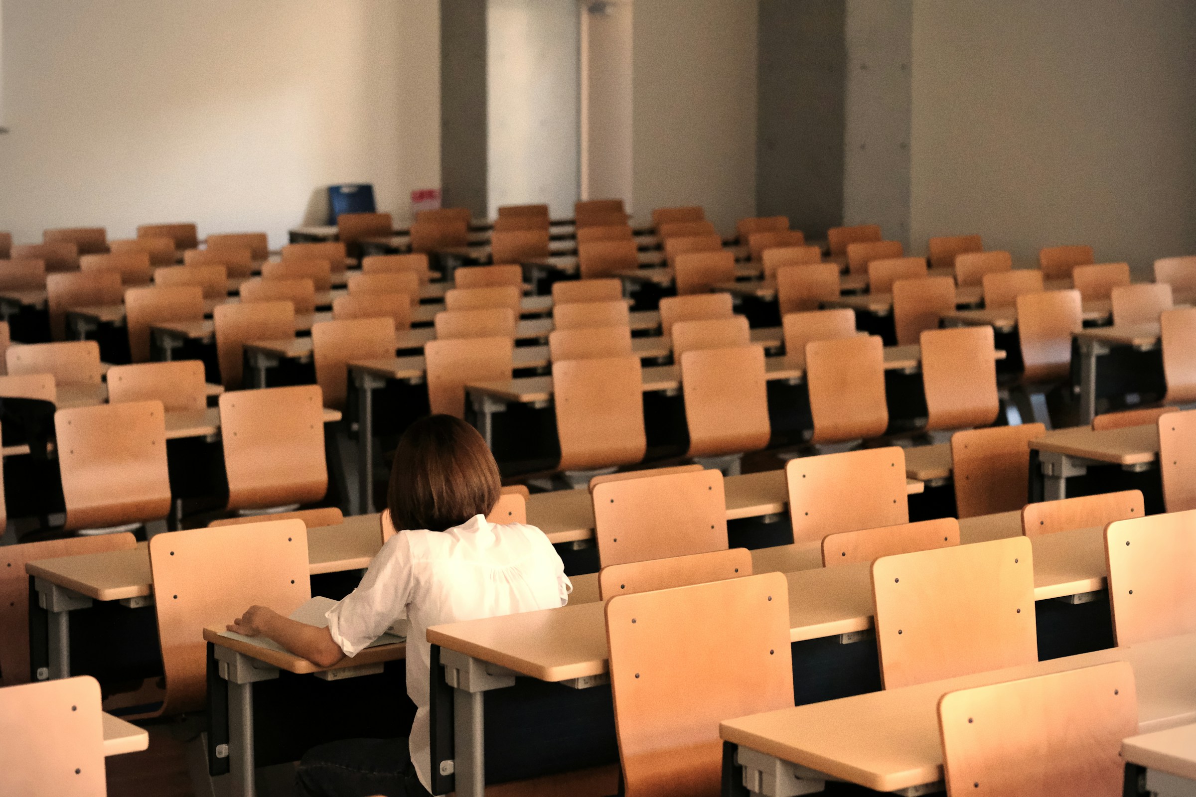 Student in classroom - How to Get an A in A-Level Chemistry