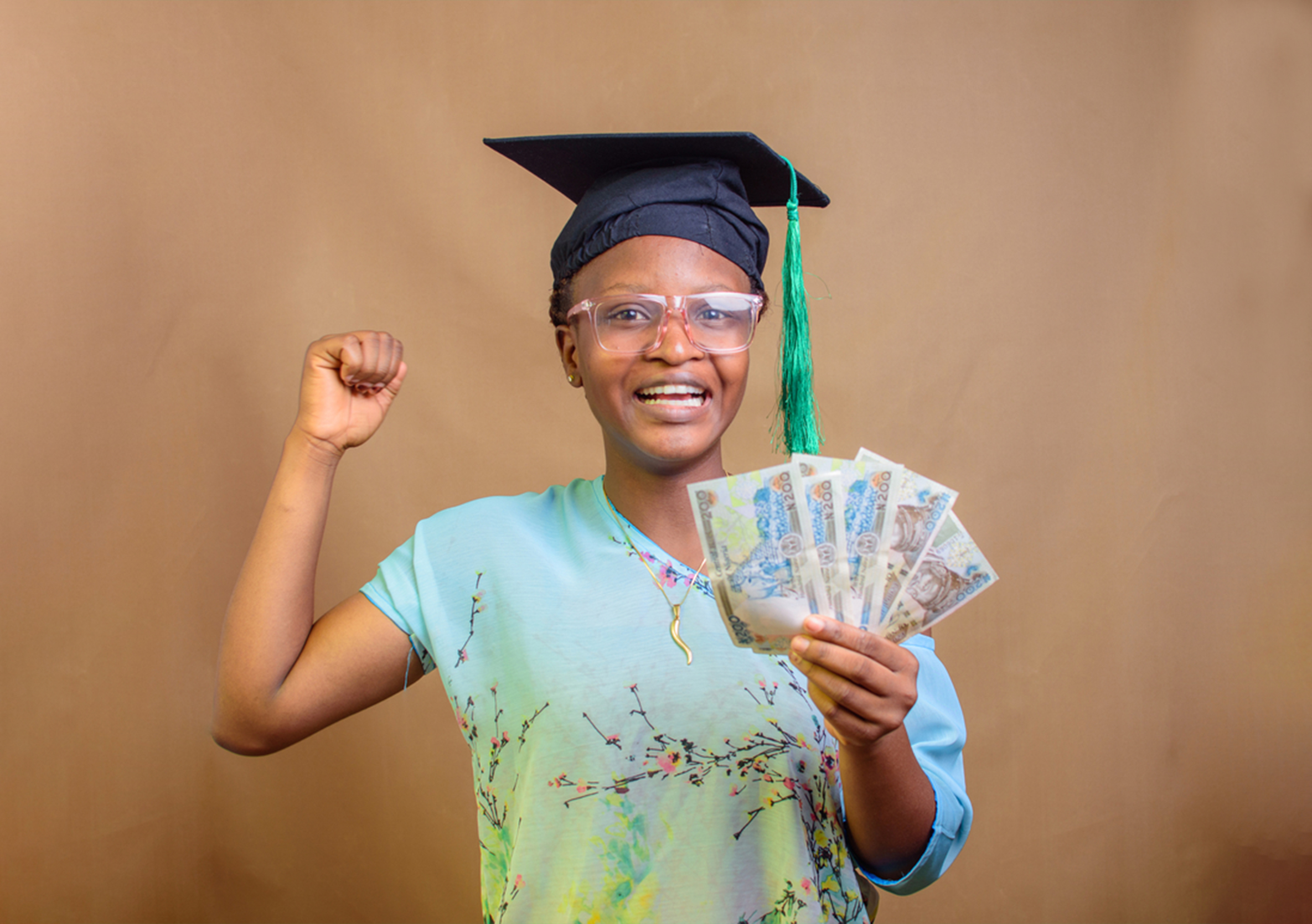 woman wearing a cap - How Much Do GCSEs Cost