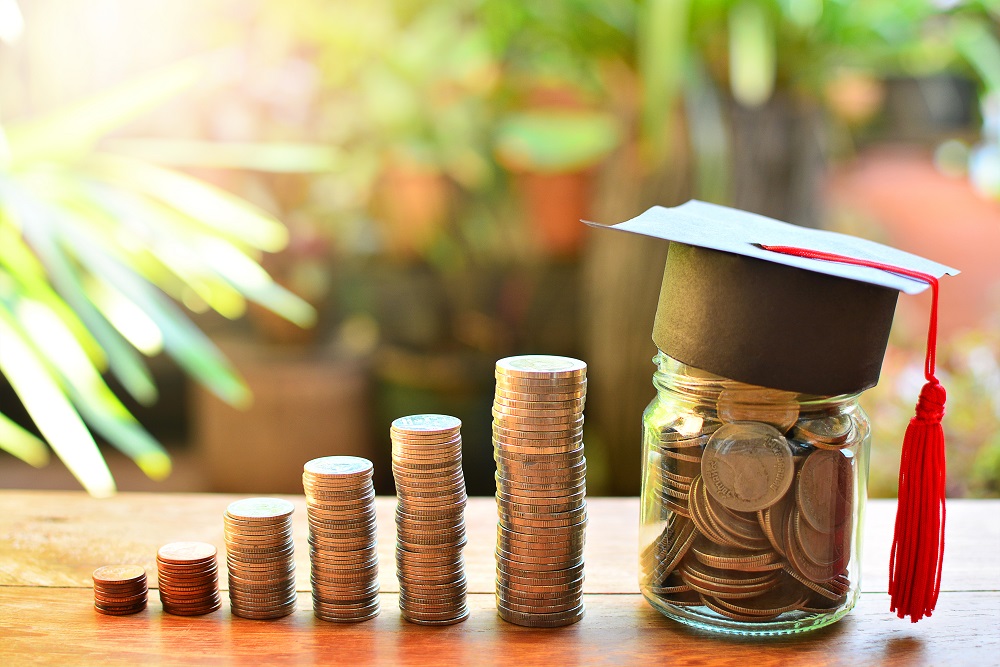 coins in jars - How Much Do GCSEs Cost
