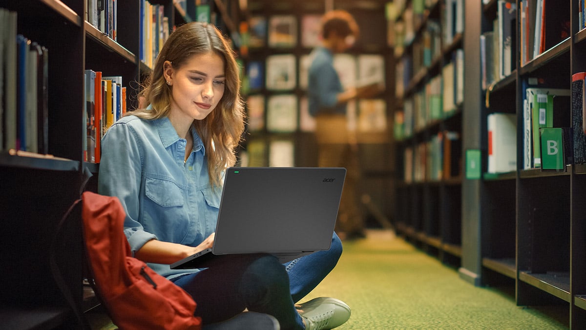 student sitting in a library - GCSE Grades Percentages