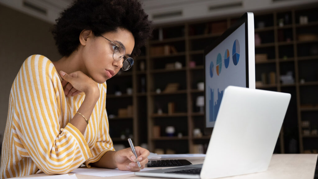 student using a laptop - How to Revise for English Language Paper 1