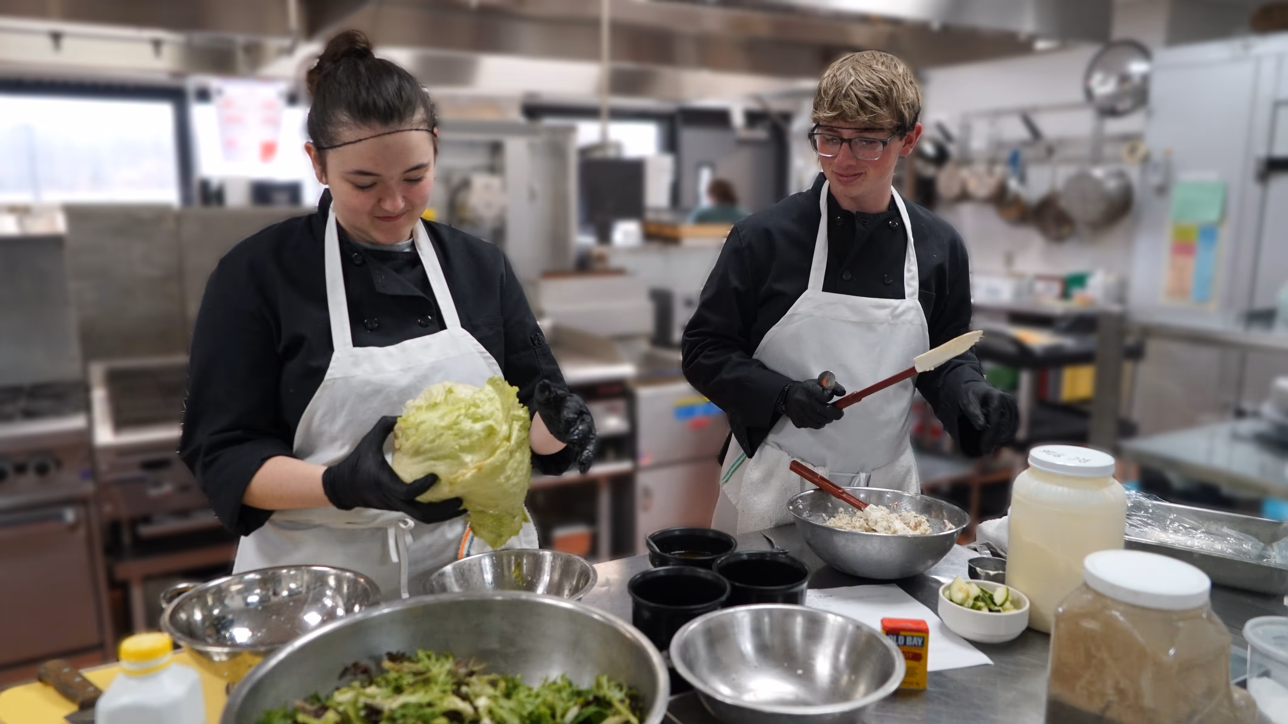 Students preparing salad.