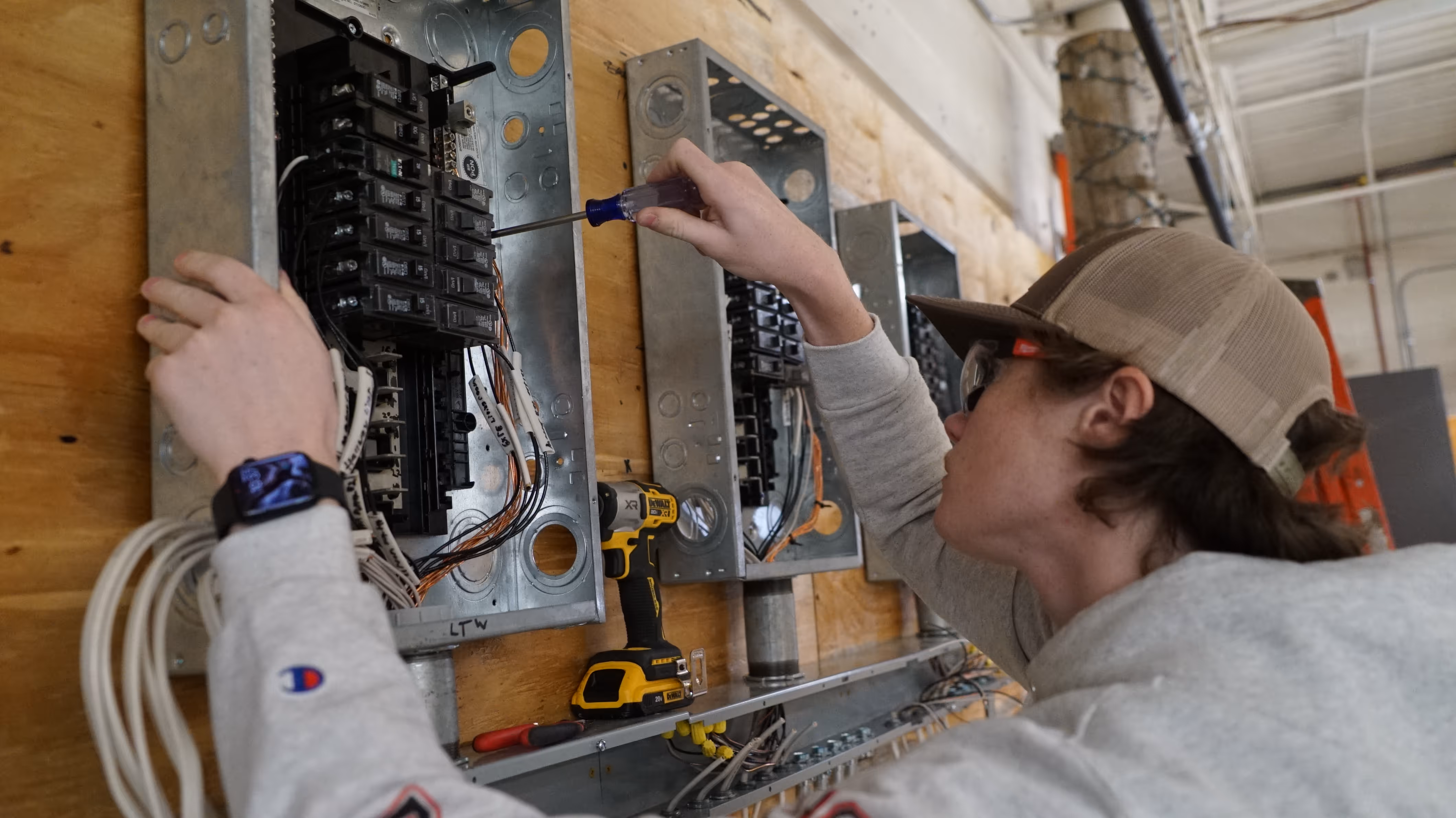 Student working on circuit box.