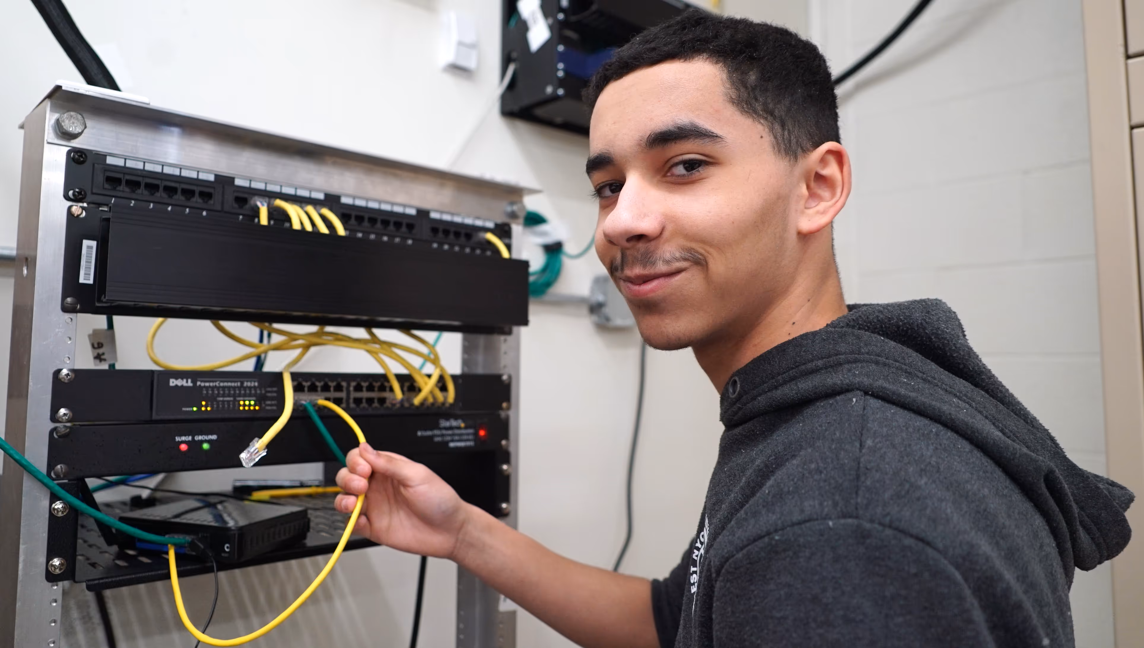 Student working on network simulation.