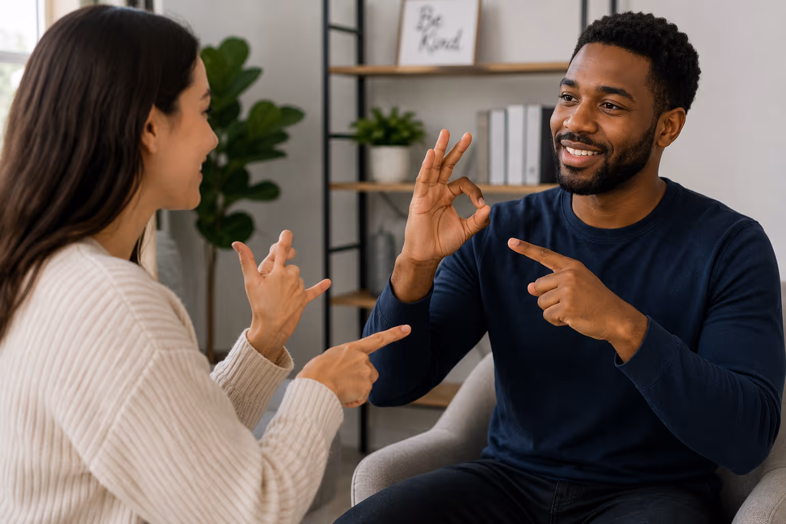 Two people talking in sign language