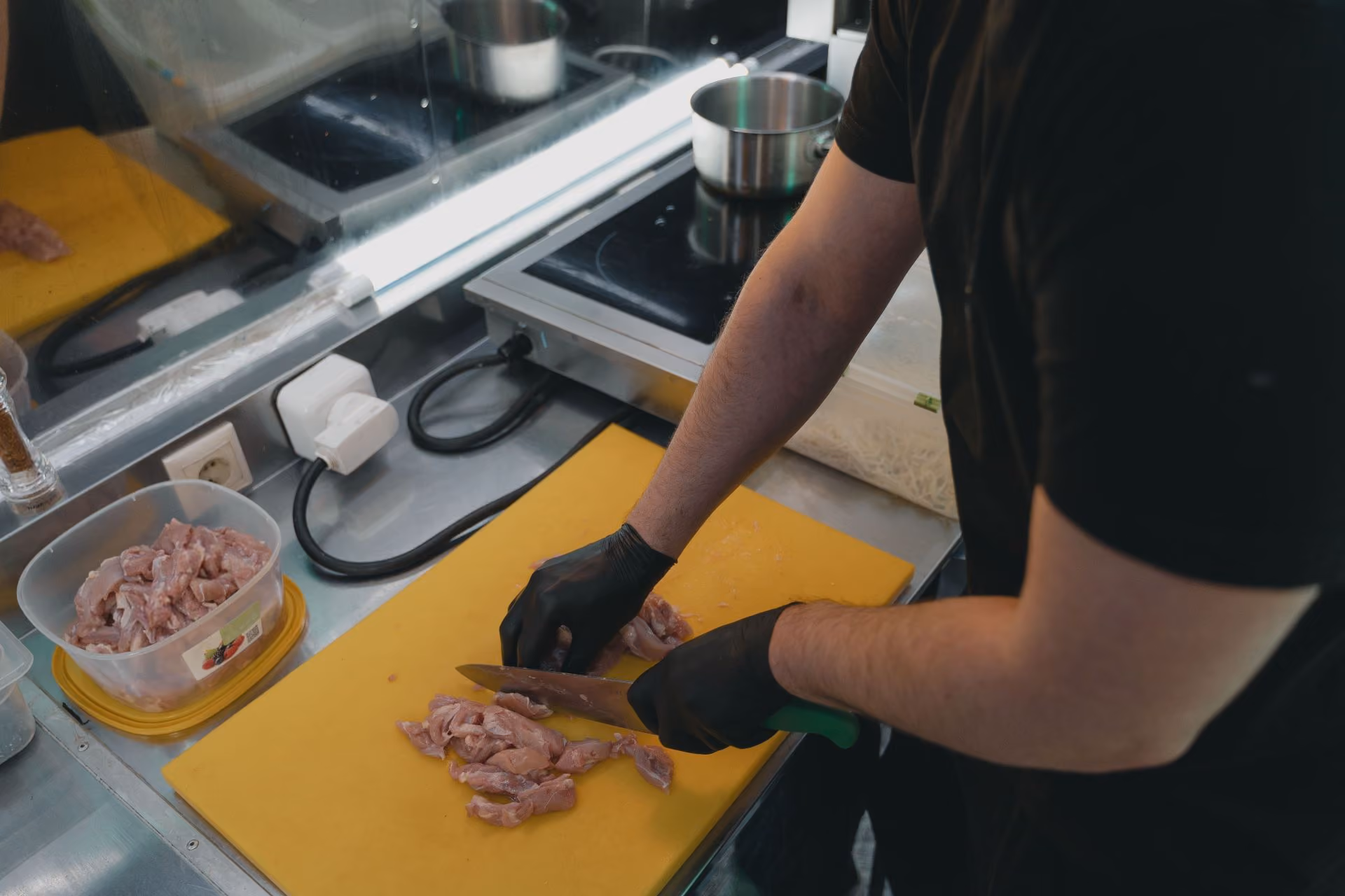 Chef preparing to plate food