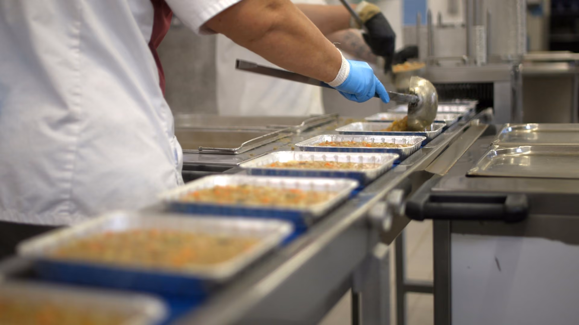 Kitchen workers preparing food