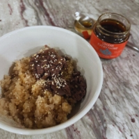 Rice Bowl Umami Original on a counter in a white bowl