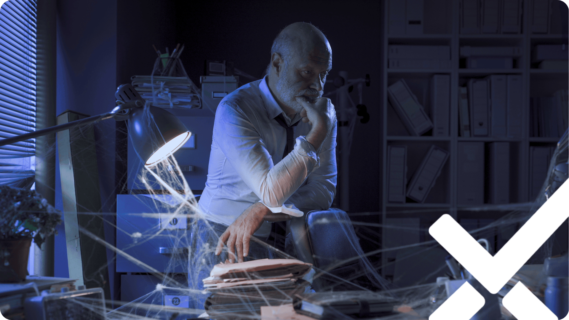 A data analyst reviewing documents by a desk lamp with a digital mapping overlay, depicting the process of tracing sustainability metrics to their origin.