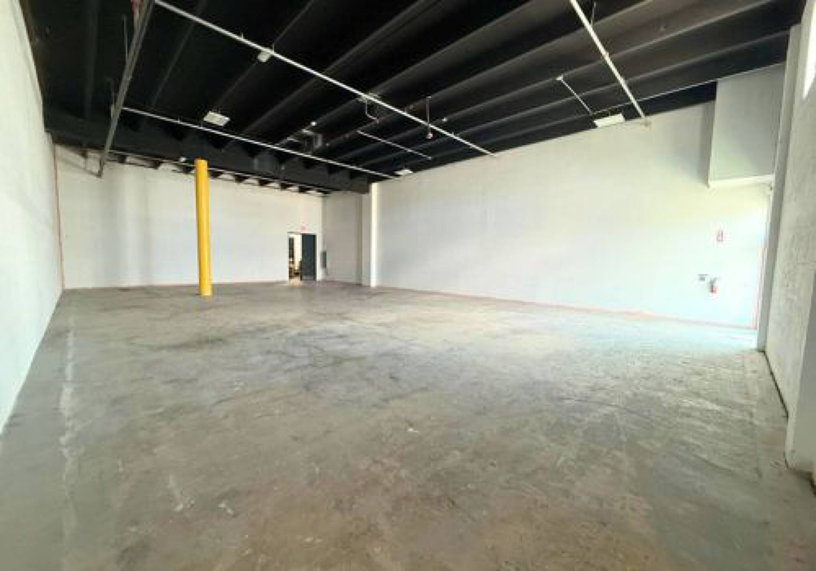 2300 W 8th Ave warehouse unit in Hialeah, warehouse interior with high ceilings