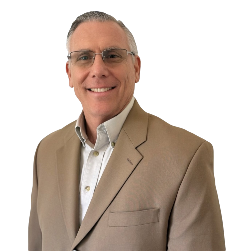 Headshot of a male with glasses in a tan suit coat. 