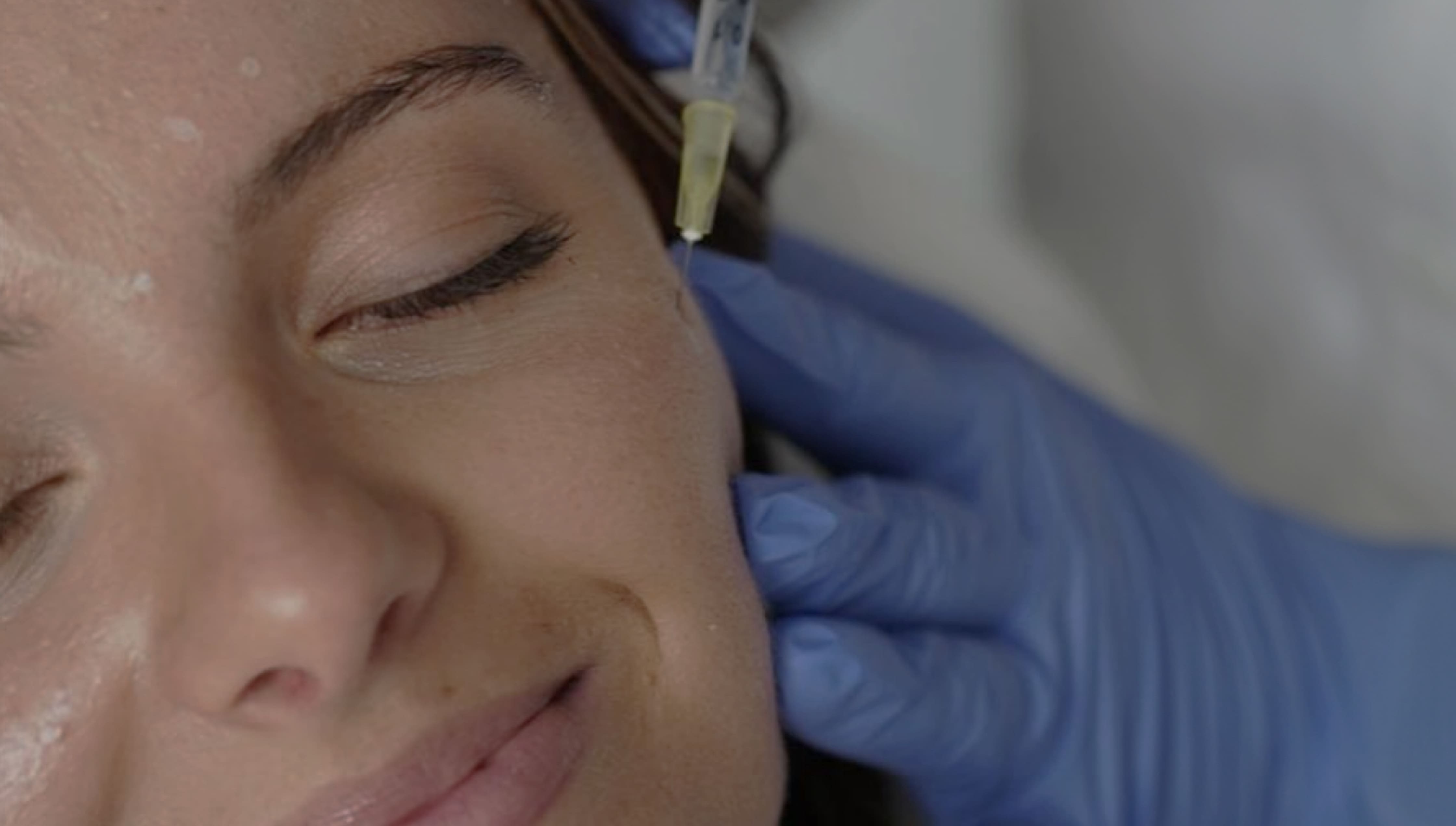 Young woman with multicoloured tattoos