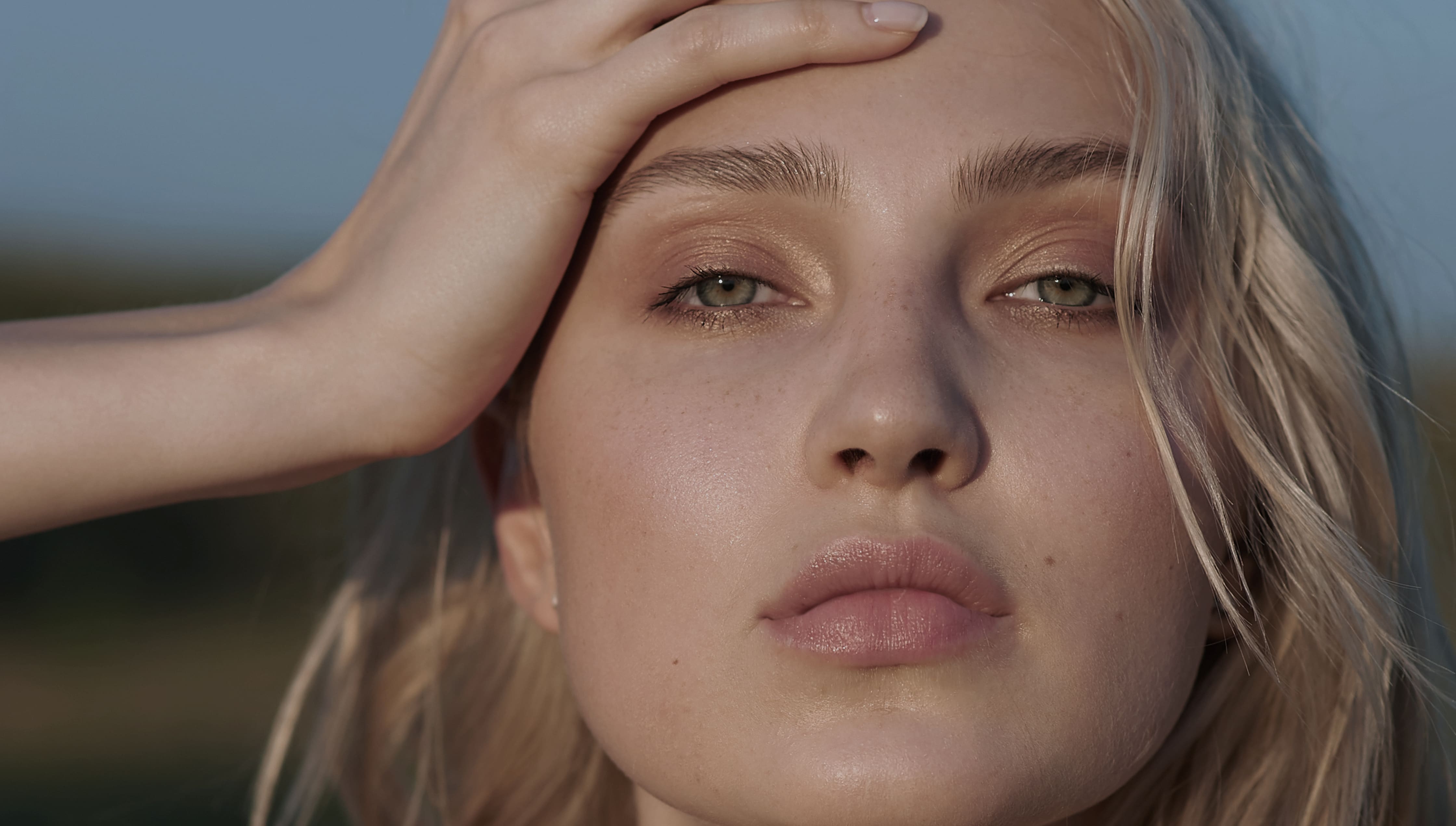 Smiling young man with tattoos