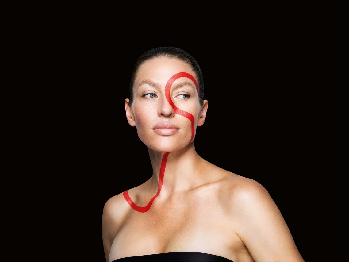 Young woman with multicoloured tattoos