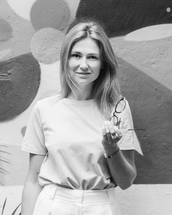 Black and white portrait of women with painted backdrop