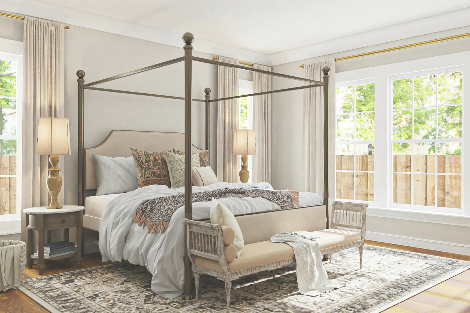 Bedroom with large windows and four-poster bed
