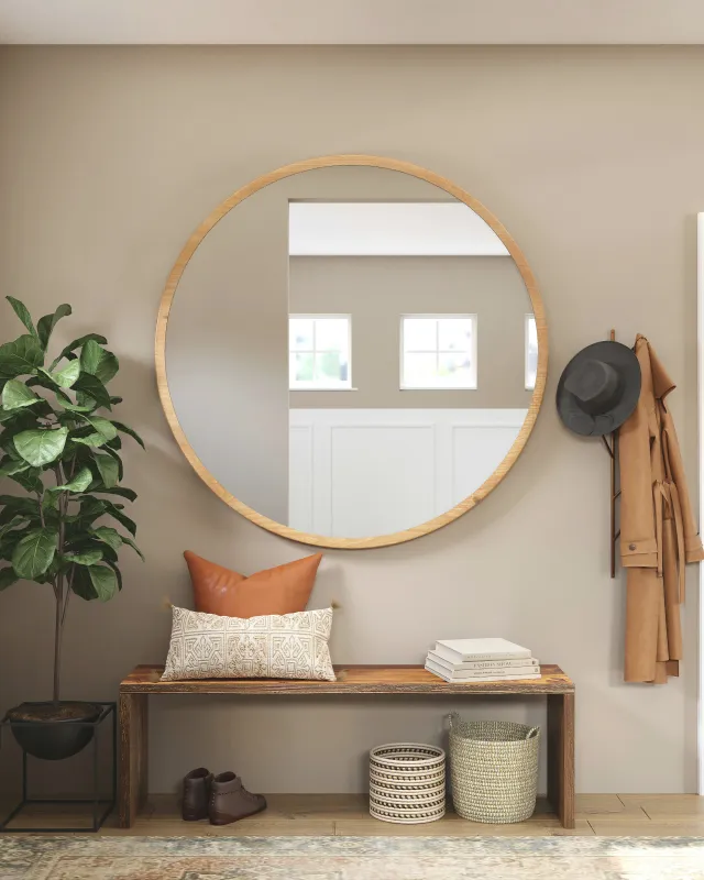 Gold mirror in hallway