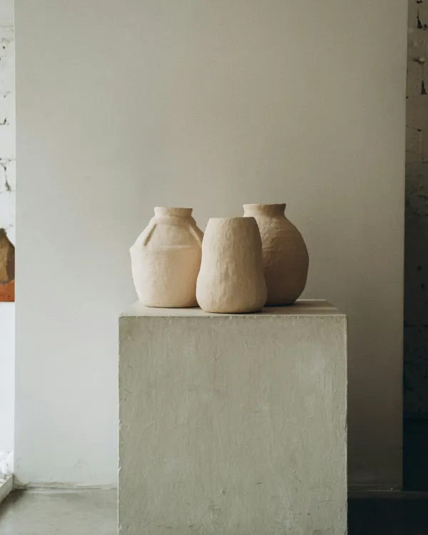 3 posts sitting on table from far away