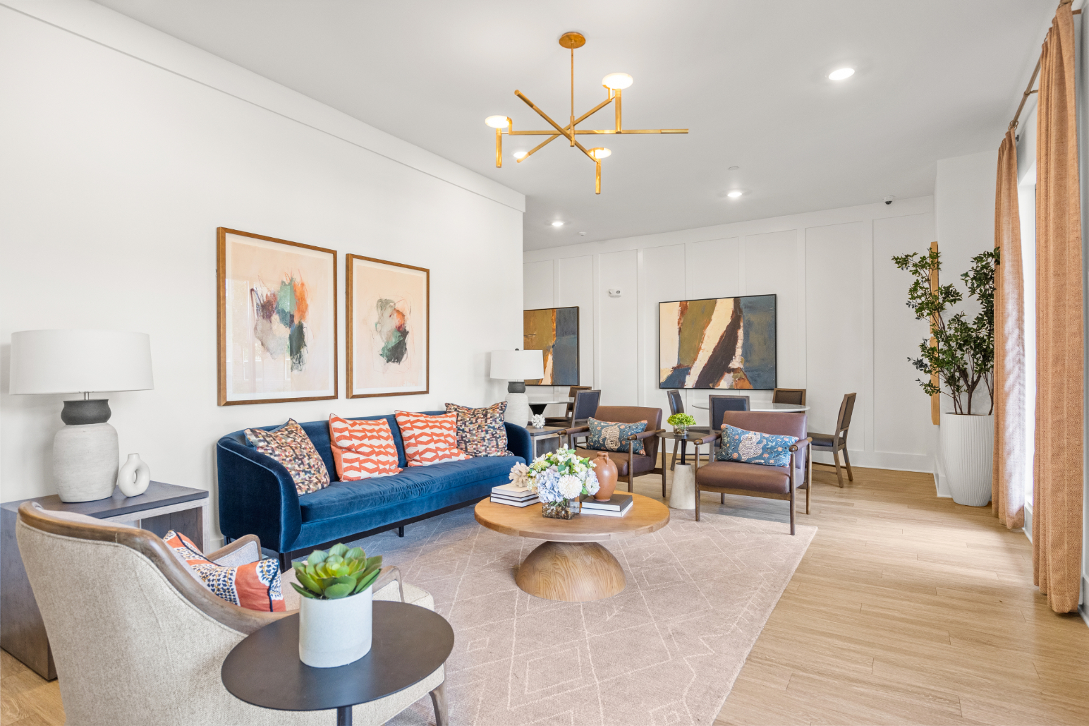 Lounge area with sofas, coffee table and wall art