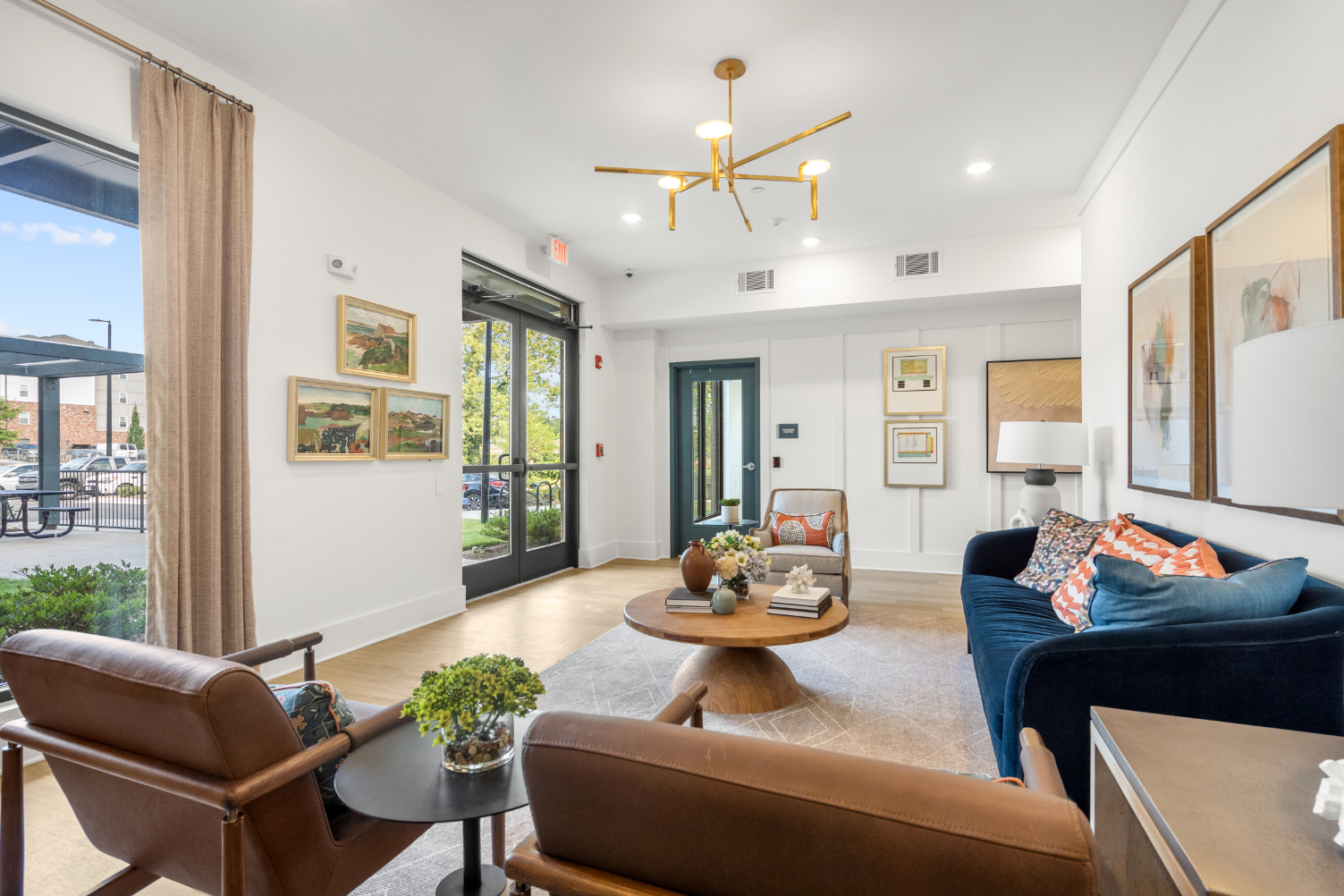 Lounge area with sofas and large windows