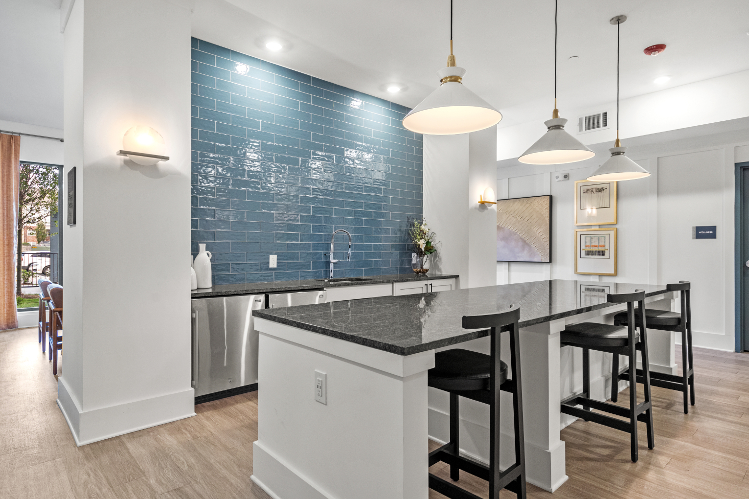 Community kitchen with bar and seating