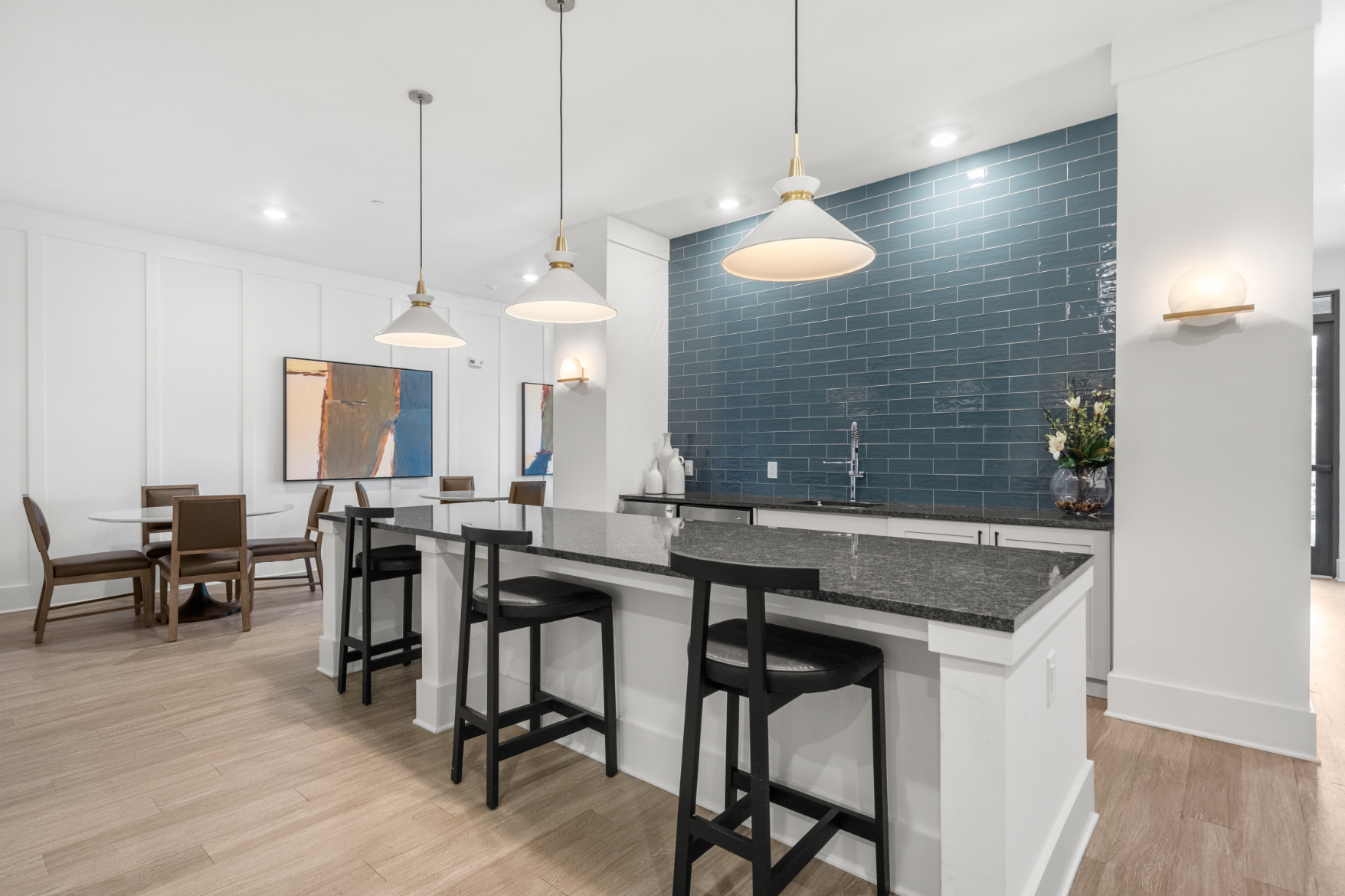 Community kitchen with bar and seating