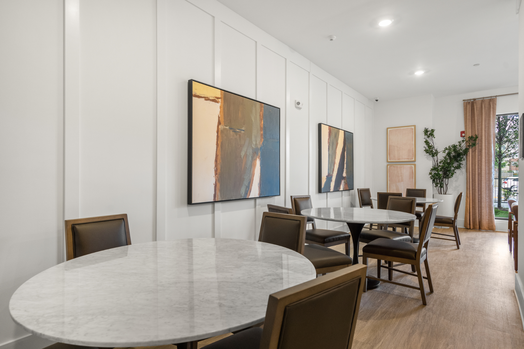 Community dining area with tables and chairs