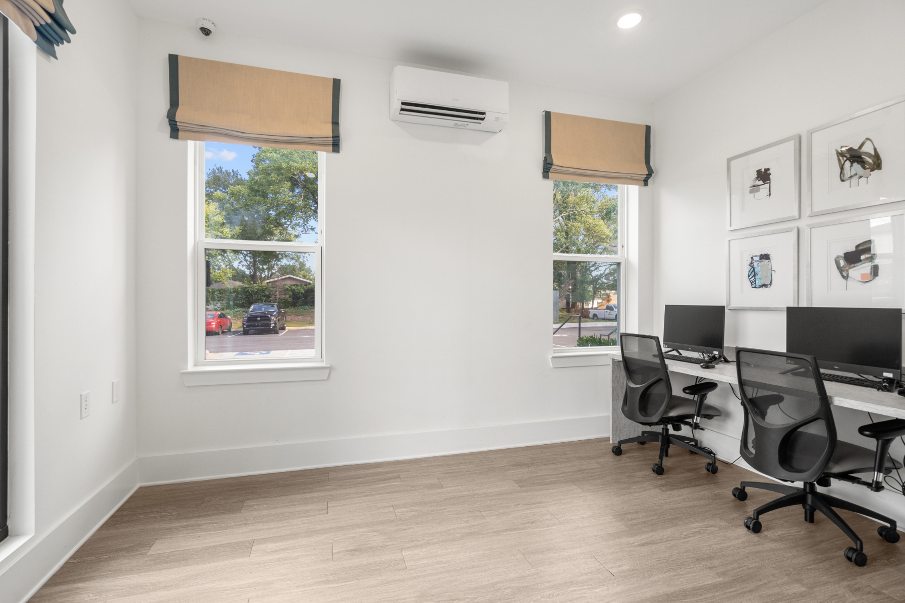 Business center with desks with computers