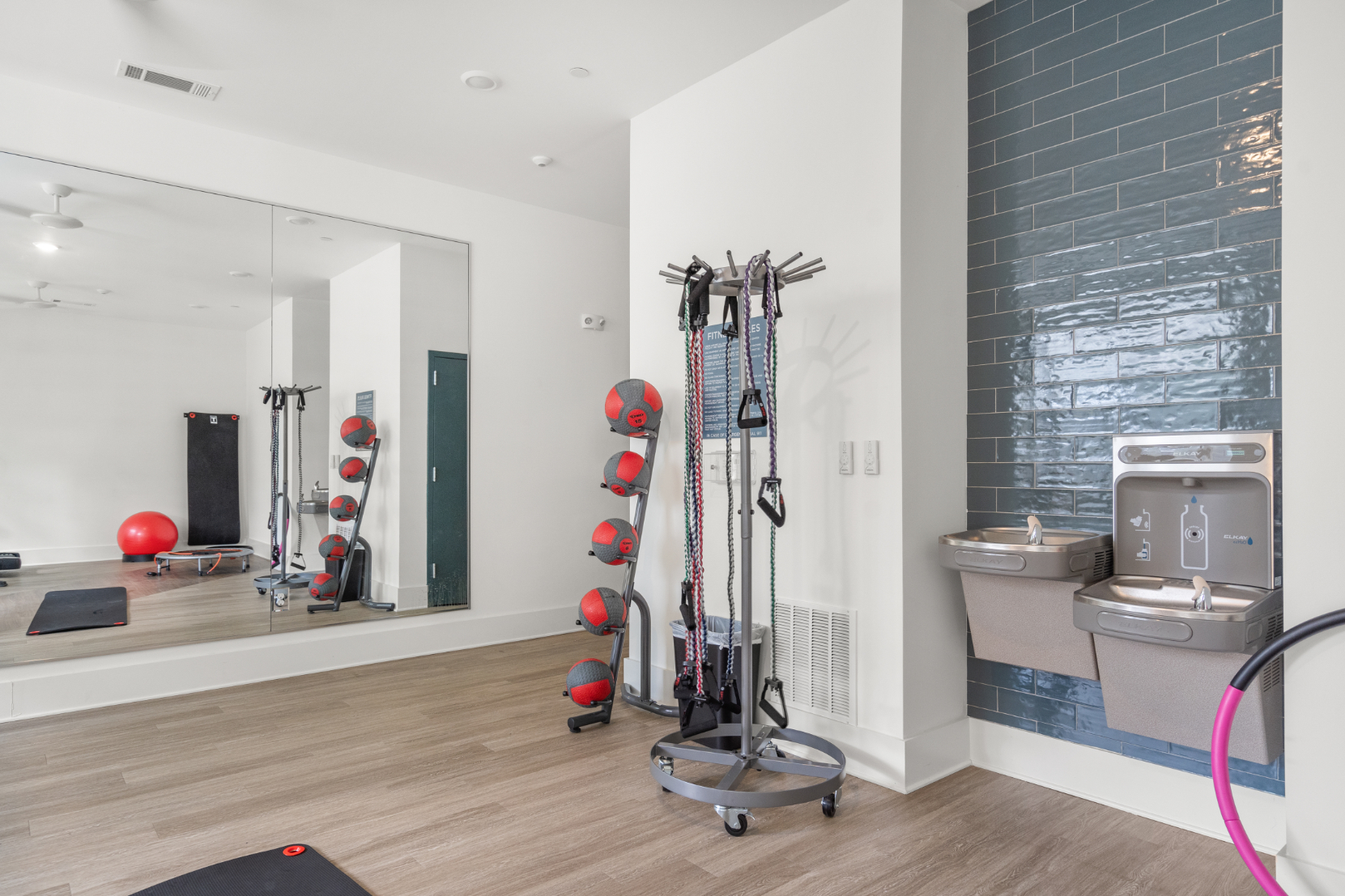 Fitness center with yoga balls and mat