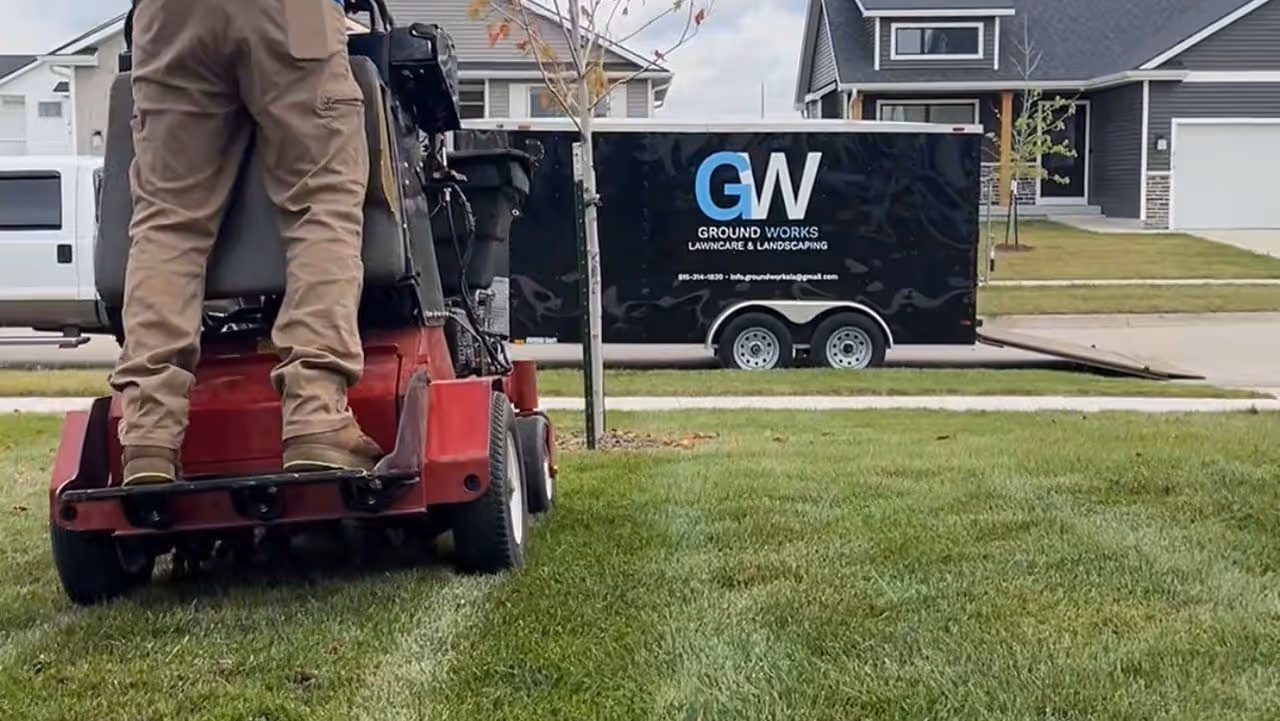 Core aeration to enhance root growth and lawn strength by Ground Works Lawncare and Landscaping.