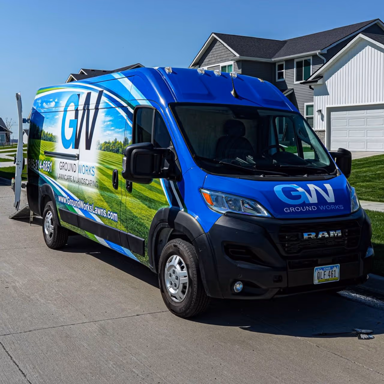 Professional landscaping crew maintaining outdoor property