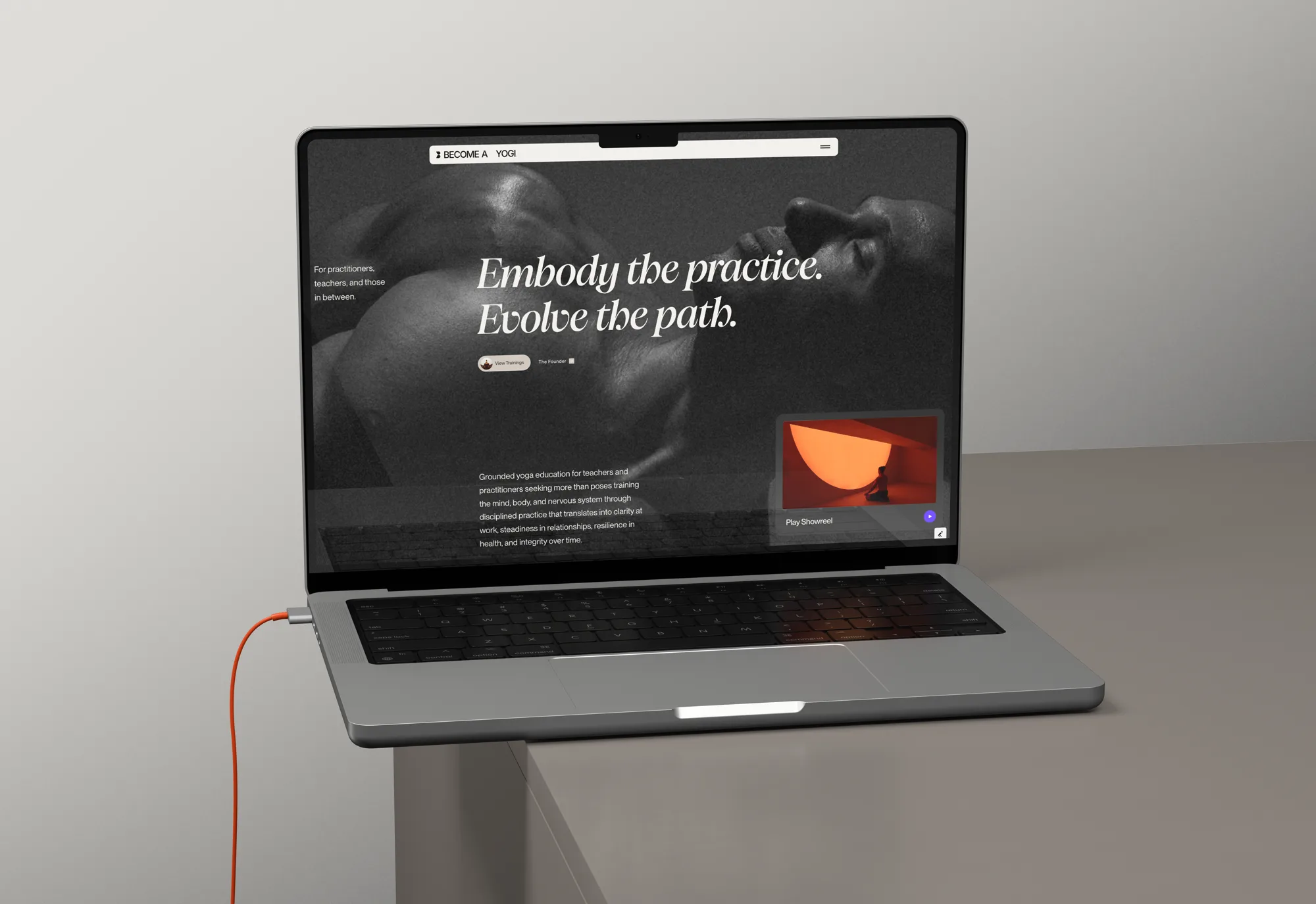 The Become A Yogi site on a MacBook Pro