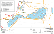 OU-E ponds showing test wells and values of arsenic found at tdifferent depths.