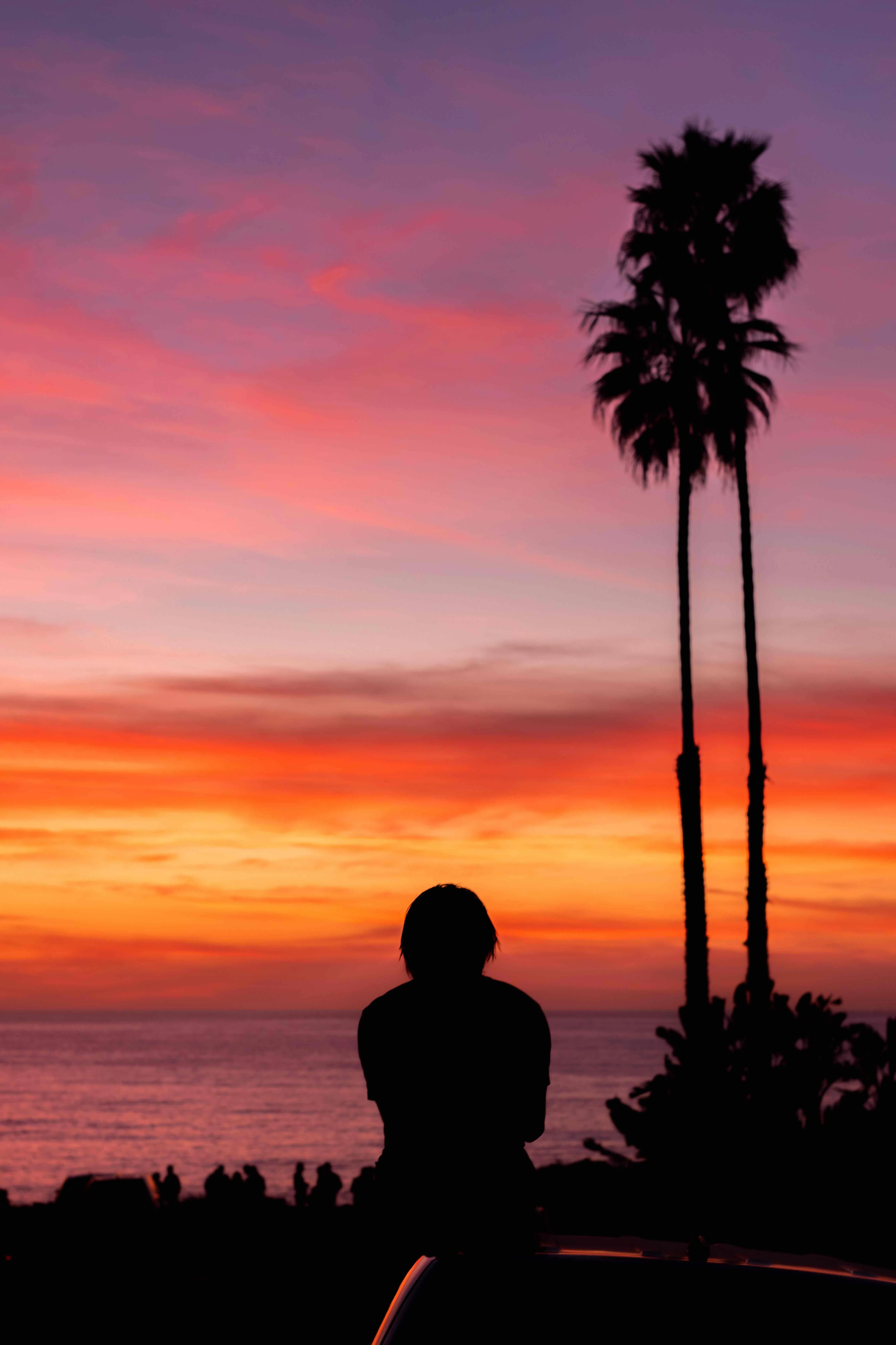 California sunset silhouette lifestyle portrait on the coastline by San Diego outdoor photographer Kanyon Studio
