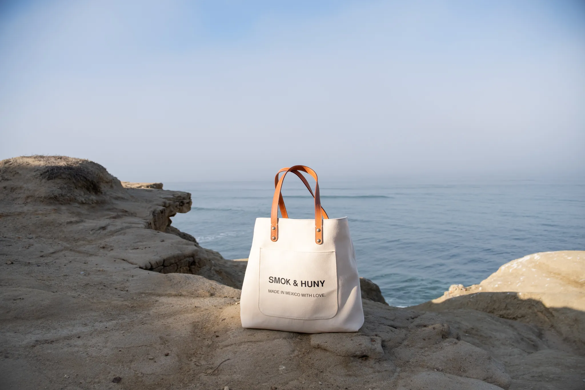Styled product photography of Smok & Huny tote with brand elements by San Diego product photographer Kanyon Studio