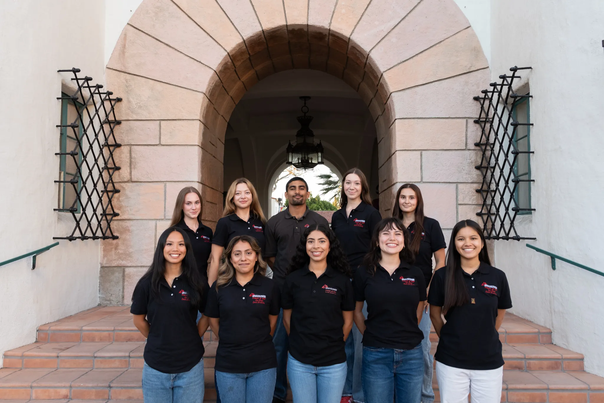 Group lifestyle portrait photography of volunteers gathered outdoors by San Diego lifestyle photographer Kanyon Studio