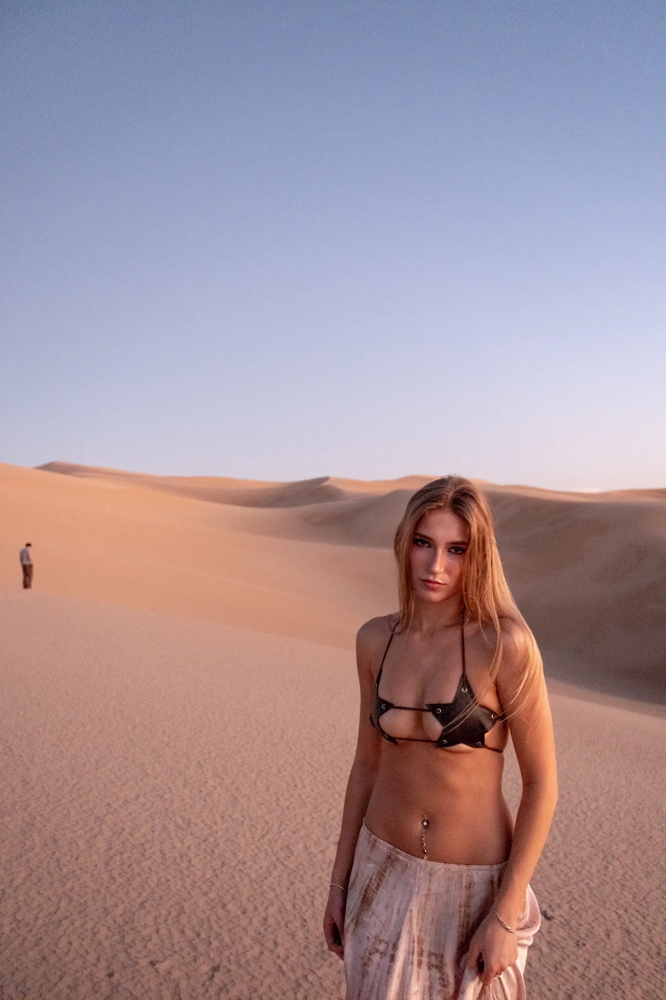 Evening sand dunes model portrait photography by outdoor lifestyle photographer Kanyon Studio in San Diego