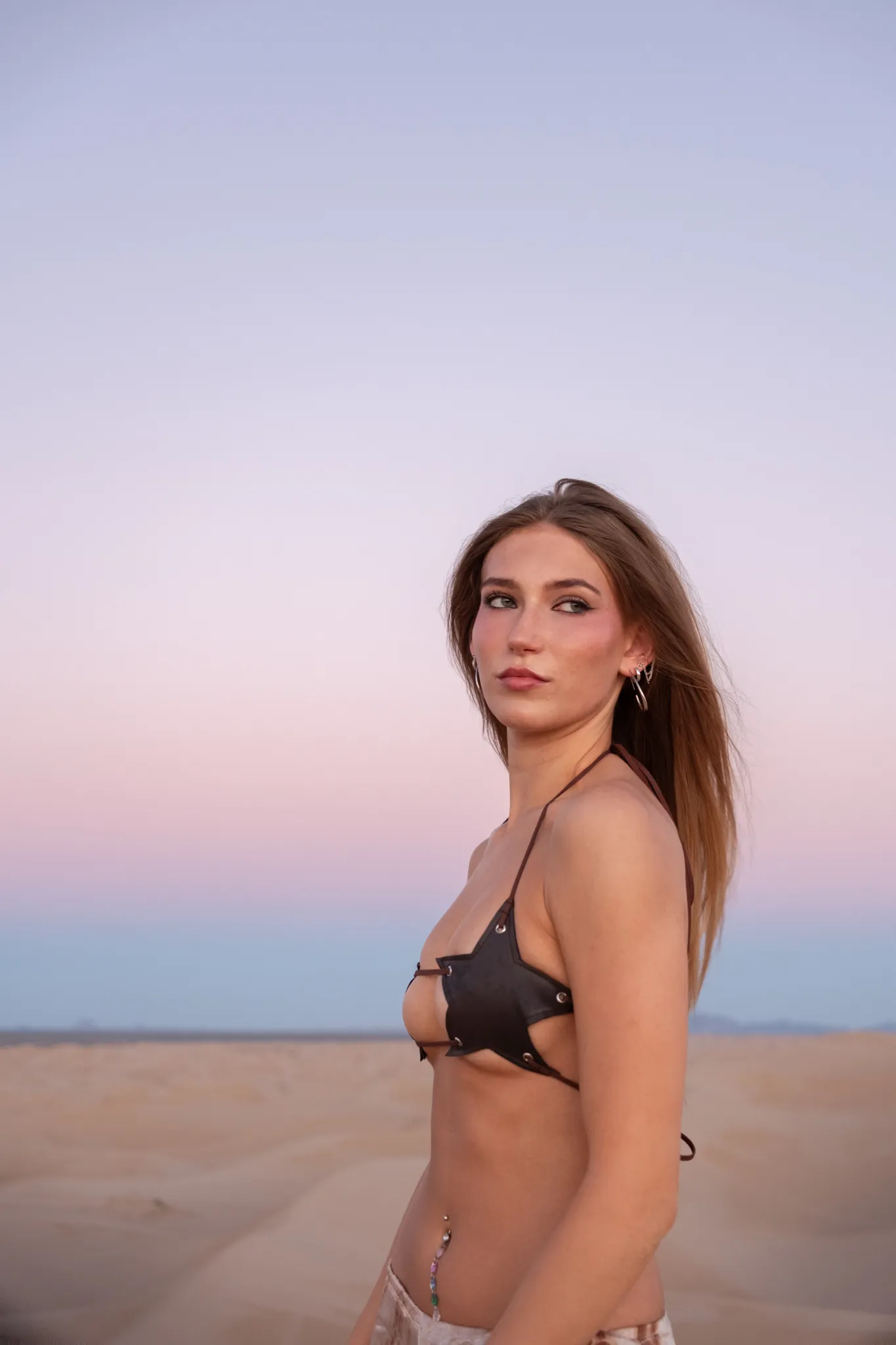 Profile against the evening sky from Kanyon Studio's desert portrait session